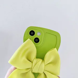 Custodia per telefono verde brillante con grande fiocco in tessuto morbida cover protettiva