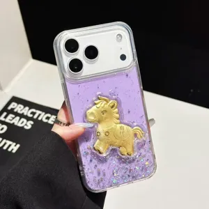 Detailed view of purple glitter iPhone case featuring a 3D golden horse ornament.