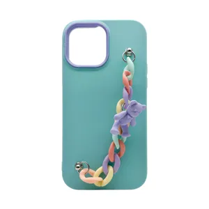 Silicone phone case with pastel chain and cute bear pendant for trendy smartphone protection style