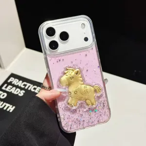 Glitter epoxy phone case for iPhone featuring a 3D gold zodiac horse design and pink sparkles.