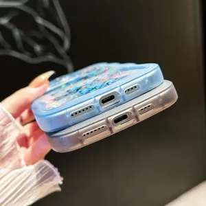 Gedetailleerd overzicht van glitter epoxy telefoonhoesje met ster en vlinder voor iPhone.