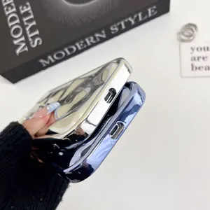 Detail shot of electroplated liquid metal meteorite texture phone case in silver and blue.