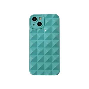 Detailed close-up view showcasing the mint green 3D pyramid studded phone case texture design.
