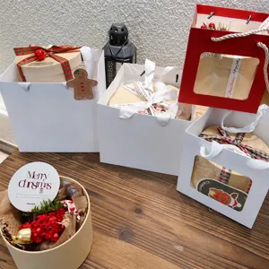 Set di sacchetti regalo di Natale borse di carta bianca e scatole tonde per confezioni festive
