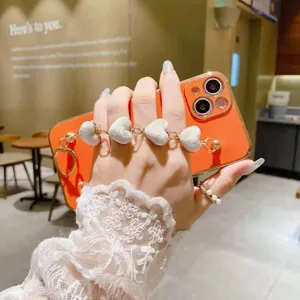 Velvet heart chain phone case with elegant wrist strap design for daily use and decoration.