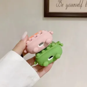 Vue détaillée de l'étui de protection en silicone AirPods Pro avec design bulle rose et vert.