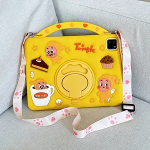 Yellow silicone iPad case with 360 rotating stand, handle and cute cartoon character strap.