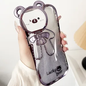 Detailed view of the cute bear electroplated glitter phone case with integrated stand design.