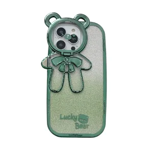Green glitter phone case detail with cute bear stand, electroplated finish, close-up view.