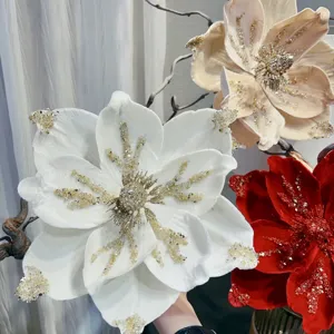 Close-up of velvet Christmas flower with glitter and rhinestones for holiday wreath DIY decor.