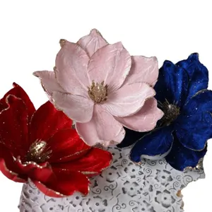 Velvet Christmas flower detail showing close-up of glitter petals and textured stamen.