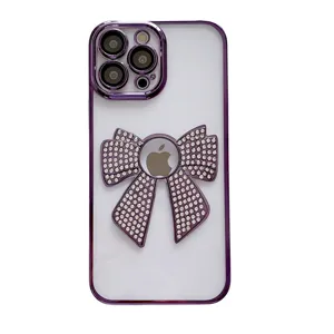 Paarse strass strik telefoonhoesje voor iPhone 14 met geïntegreerde camera lens beschermer zacht.
