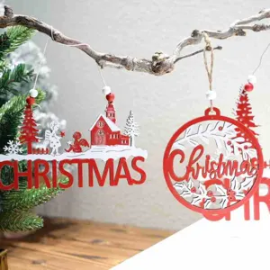 Detailed close-up of red wooden Christmas hanging ornaments for holiday tree and festive decor.