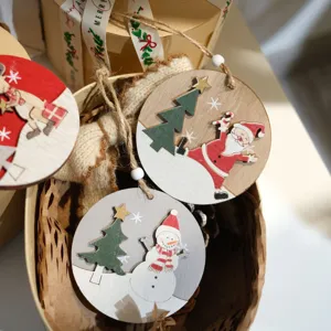 Round wooden Christmas hanging ornaments with cute Santa and snowman designs for holiday decor.