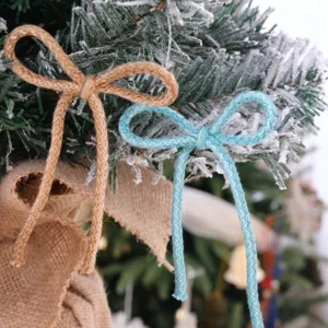 Handmade Christmas tree decorative bows, jute and cotton rope bows for holiday gift box.