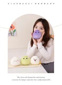 Cute plush dumpling pendant with lovely expression, soft material and exquisite details.
