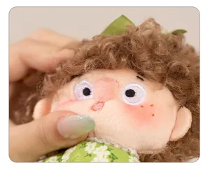 Cute curly hair plush doll detail shot, ultra-soft material, perfect bag pendant accessory.