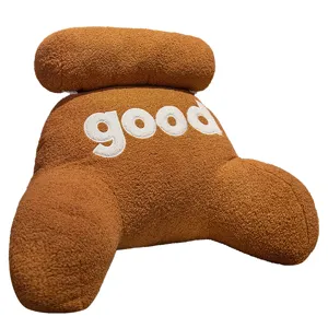 Brown teddy velvet reading pillow with headrest and good embroidery for bed support.