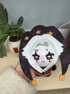Detailed shot of the 10cm freak circus pierrot cotton plush doll with jester hat features.