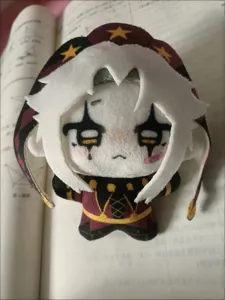 Cute 10cm cotton plush doll with jester hat and unique makeup design, perfect for collectors.