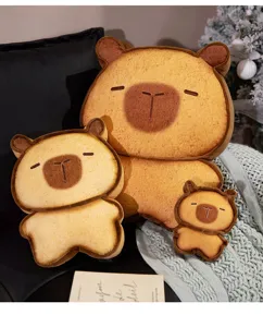 Detailed view of cute toast capybara plush toys, soft fabric and cozy home decor style close-up.