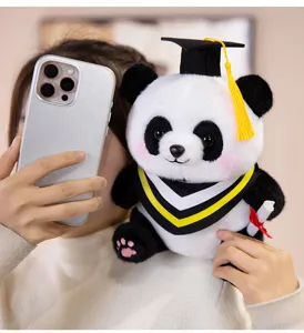 Graduation panda plush toy detail close-up showcasing cap and diploma in hand view.