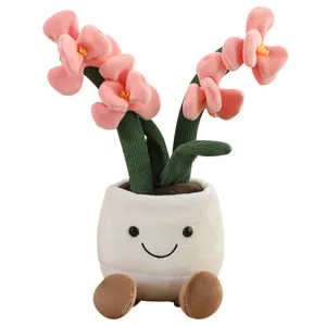 Adorable plush potted plant toy featuring pink flowers and smiling white pot decor.