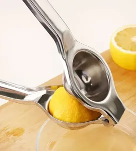 Stainless steel manual lemon squeezer handheld citrus juicer kitchen press tool detail view.
