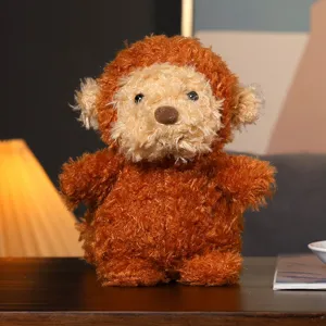 Jolie poupée en peluche marron duveteuse, animal en peluche doux compagnon cadeau pour enfants.