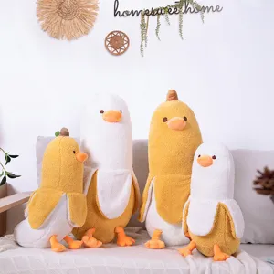 Detailed shot of cute banana duck plush toys arranged neatly on a cozy sofa with nice home decor.