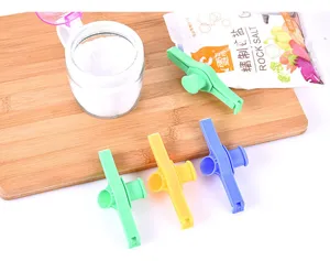 Kitchen food sealing clip with pouring spout, plastic bag clip for snacks, airtight seal.