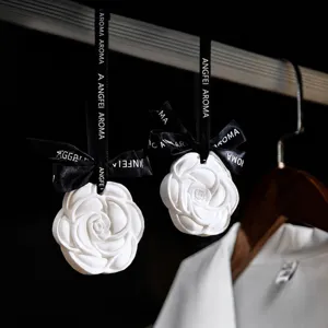 White camellia scented wax tablet for wardrobe, long-lasting floral fragrance air freshener.
