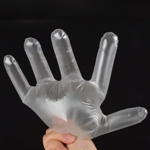 Gants jetables transparents en plastique PE pour cuisine alimentation et usage quotidien.