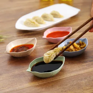 Wheat straw leaf-shaped mini seasoning dish set for soy sauce, vinegar, and home kitchen use.