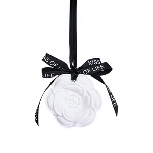 White camellia aroma wax tablet hanging pendant for wardrobe car fragrance decor.