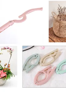 Portable folding clothes hanger travel plastic clothes rack space saving dorm essential detail