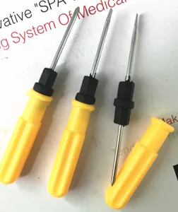 Mini double-use screwdriver close-up, portable repair tool with yellow handle and metal bit.