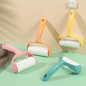 Portable lint roller for clothes with tearable sticky paper and cute paw hook set for daily cleaning.