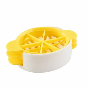 Multi-functional plastic egg slicer kitchen tool with compact yellow and white design.