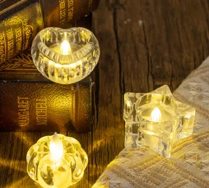 Detailed view of clear glass LED tea lights in heart, star, and ribbed shapes for romantic decor