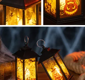 Vista dettagliata di lanterne di Halloween con luce calda, motivi zucca e strega.