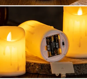 Gros plan du compartiment à piles d'une bougie LED vacillante avec design effet de cire