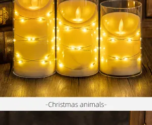Close-up of three LED flameless candles with warm string lights in glass jars