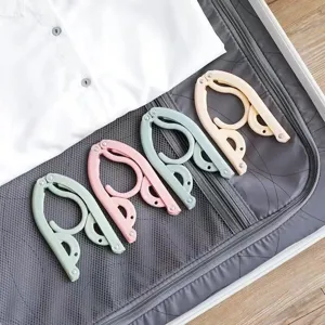 Portable foldable clothes hangers travel plastic space saving drying rack for dormitory.