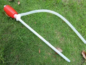 Manual fuel pump and liquid transfer suction pipe detail view for car and motorcycle use.