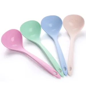 Set of four colorful long-handled soup spoons made of wheat straw plastic for kitchen use.