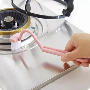 Ergonomic V-shaped plastic cleaning brush with long handle for deep gap cleaning.