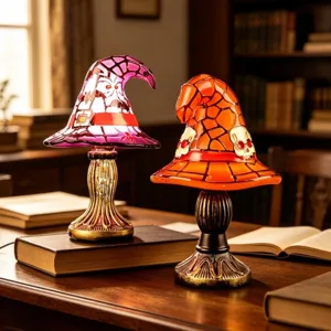 Decorative Halloween witch hat lamps with glowing mosaic stained glass and skull patterns