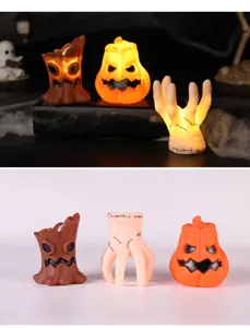 Atmospheric Halloween LED night lights set with pumpkin, ghost hand, and tree monster shapes