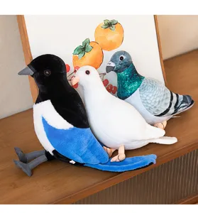 Detail shot of realistic plush bird toys showcasing soft texture and cute design on wood surface
